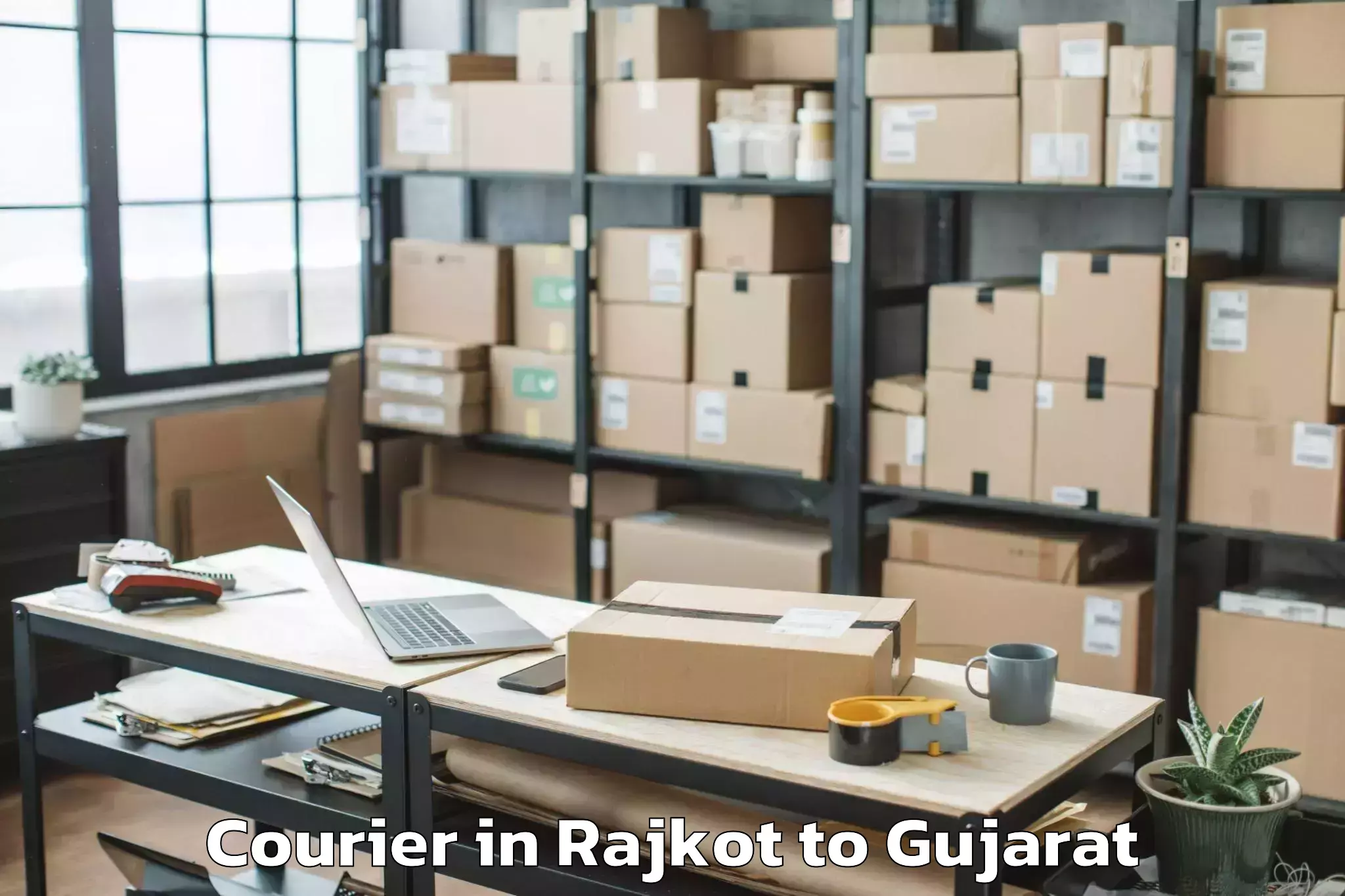 Trusted Rajkot to Gujarat University Of Transpla Courier